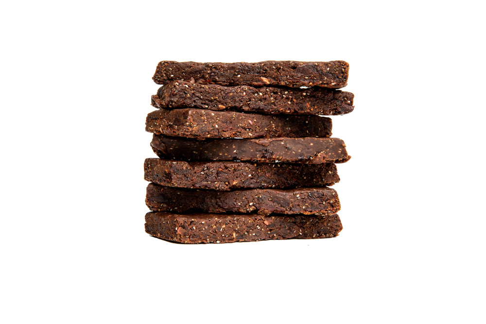 Stack of 7 wrapped 1 oz Cherry Cacao Whole Food Energy Bars